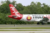 Air Asia flight at Hat Yai airport - Click for larger image Air Asia flight at Hat Yai airport - Click for larger image