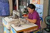 Roadside clothes repairs and alterations in Hat Yai - Click for larger image Roadside clothes repairs and alterations in Hat Yai - Click for larger image