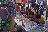 Buddhist amulets for sale at Songkhla Sunday Market - Click for larger image