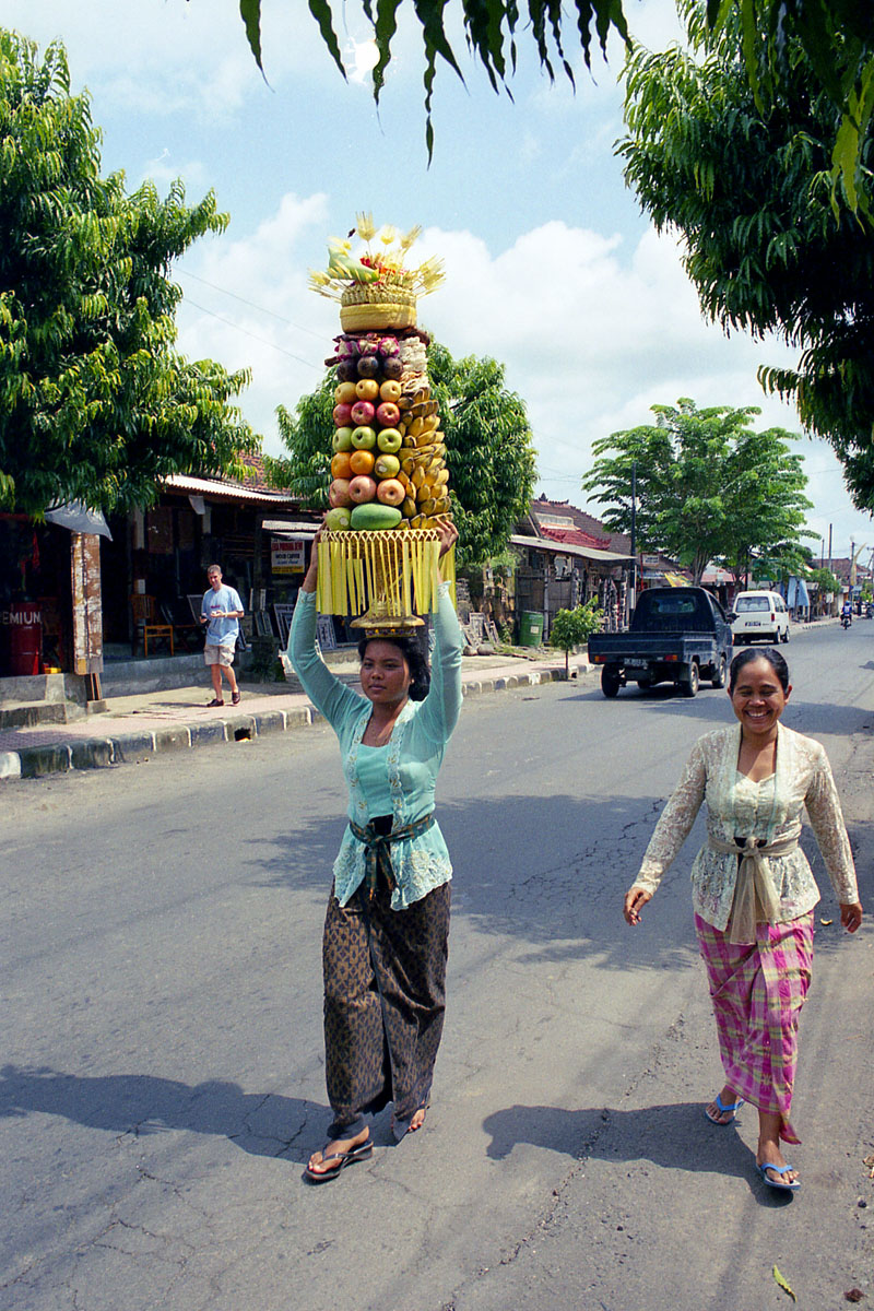 Fruit offerings being taken to a temple