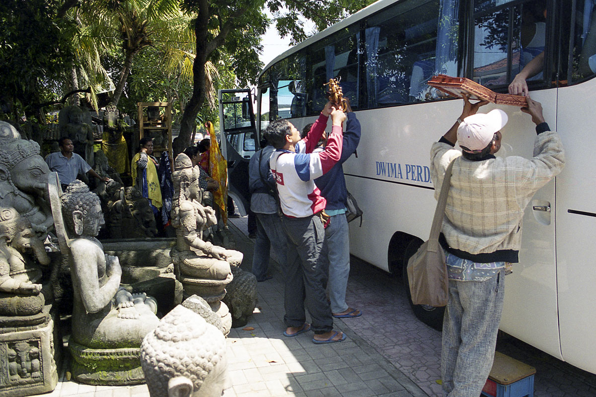 Hassling tourists to buy souvenirs