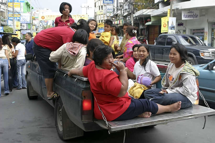 Classy Thai woman on a pickup truck