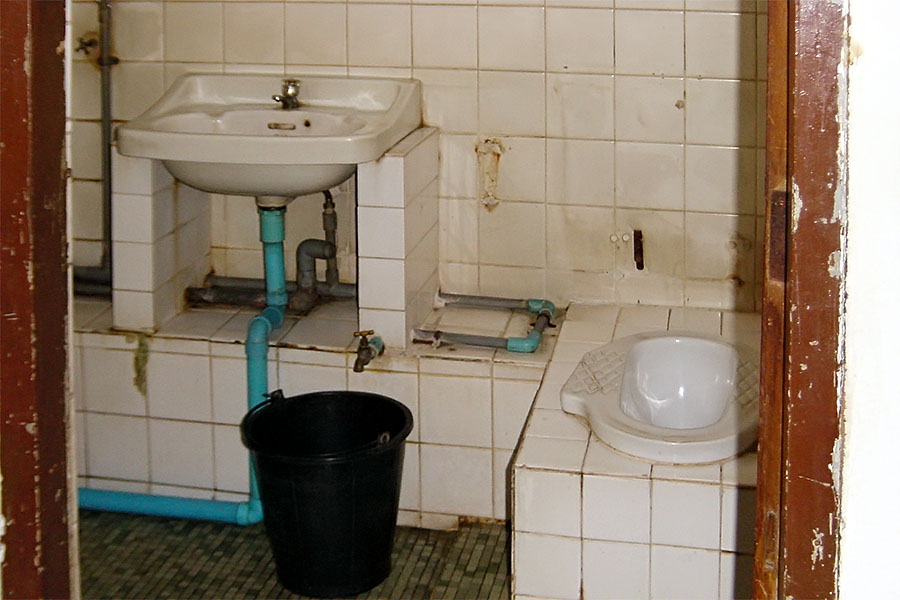 Squat toilet in a backpacker guesthouse