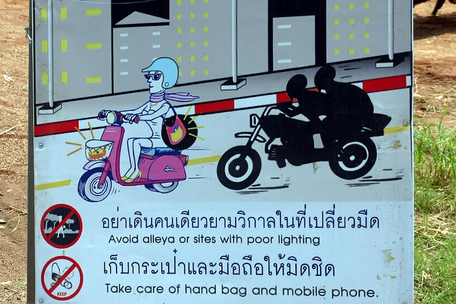 Bag snatchers on motorbikes