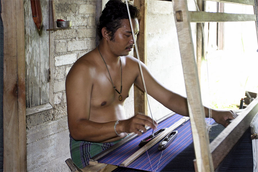 Weaving cloth by hand on Yo island, Songkhla