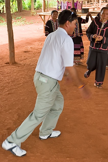 Embarrassing Bangkok tourist dancing with the hill tribe people, Chiang Rai