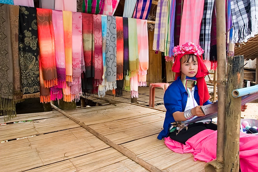 Hilltribe girl weaving cloth, Chiang Rai