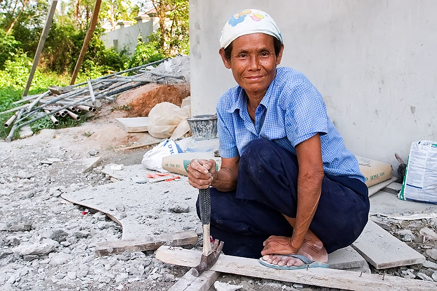 Thai women involved in construction work incredibly hard