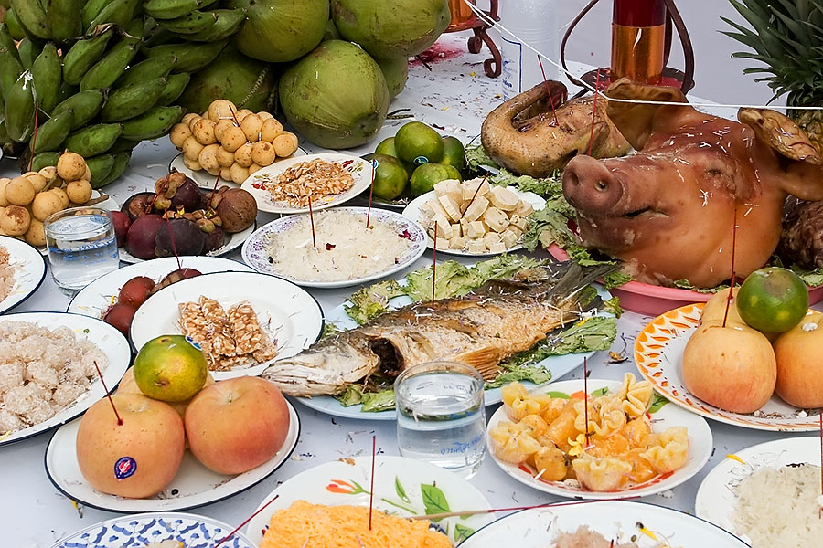 Food offerings at a Chinese Buddhist temple in Songkhla