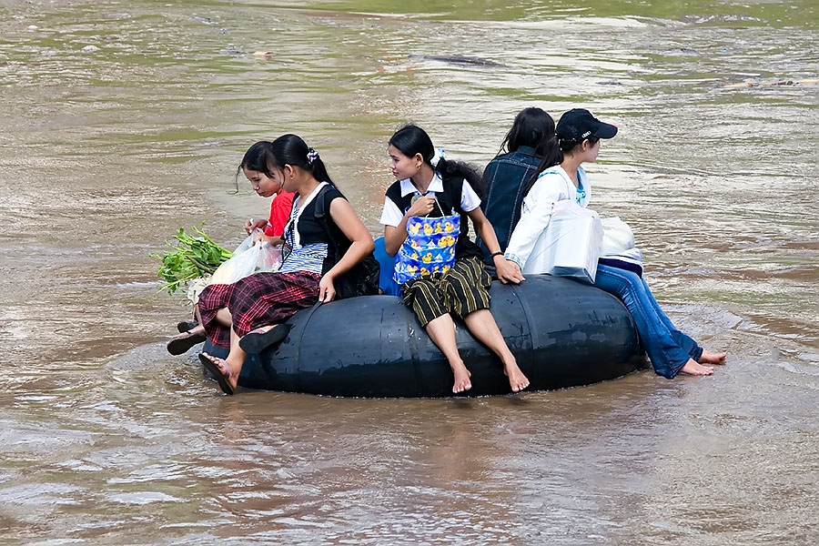 Burmese women crossing the Moei River to Mae Sot