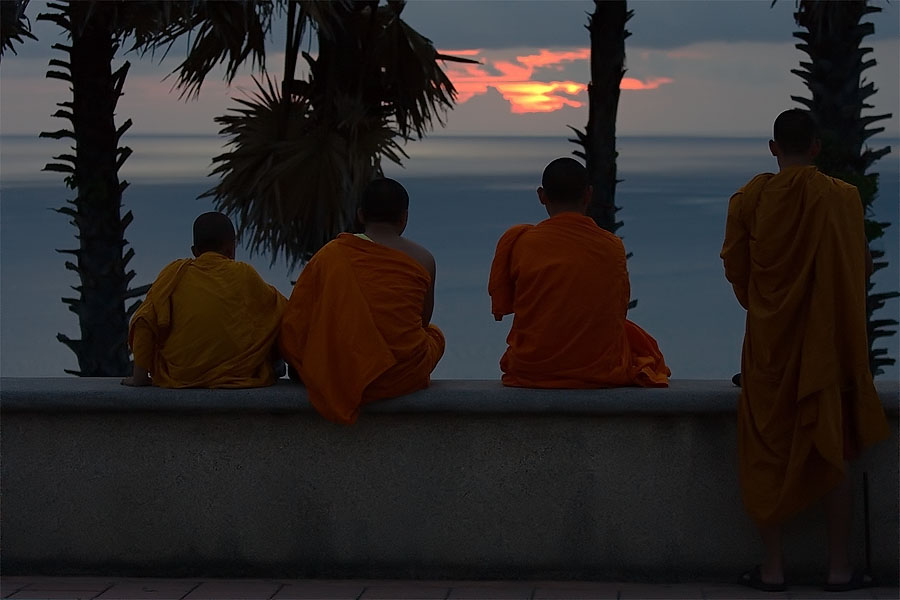 Monks watching the sunset in Phuket