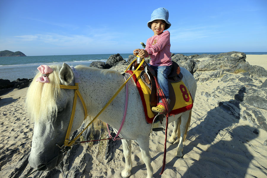 Horseback riding on Samila Beach