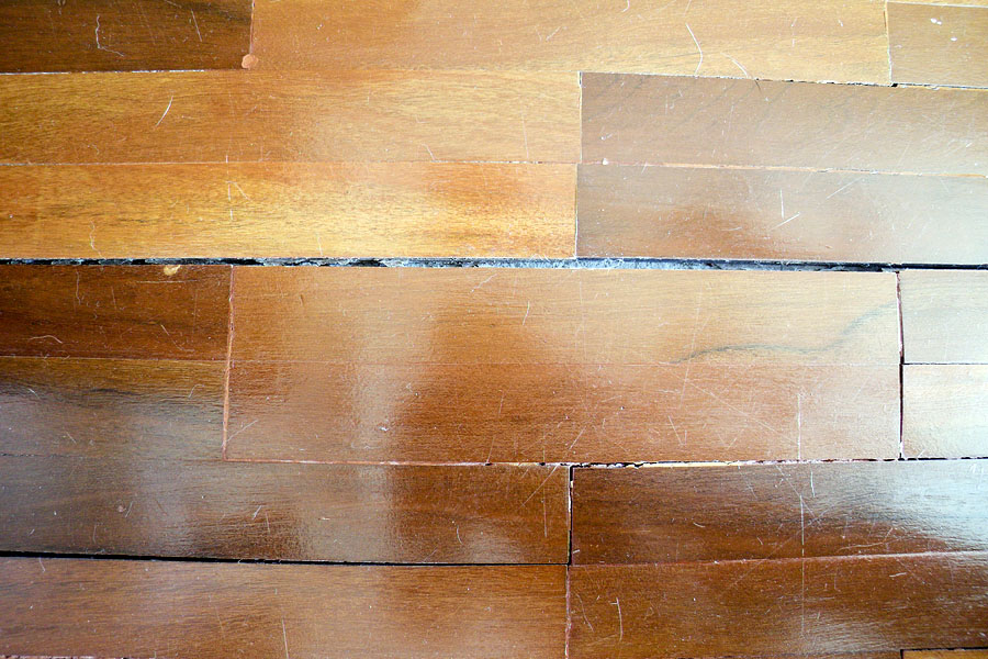 The floor had been laid so badly that eventually it would have needed replacing anyway
