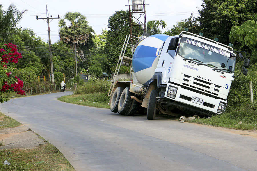 Thai cement truck in a ditch