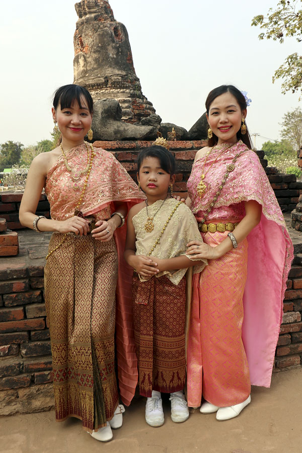 Thais visiting Ayuthaya in traditional costume