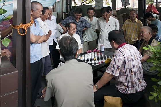 Chinese men playing a board game