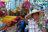 Vendor outside a Buddhist temple, Singapore - Click for larger image