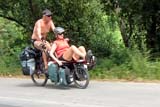 Fuzzy photo of foreigners cycling in Thailand - Click for larger image