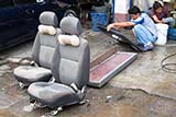 Flood damaged car being dried out and reassembled - Click for larger image