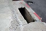 In Thailand it is necessary to permanently watch your step while walking around on the streets - Click for larger image