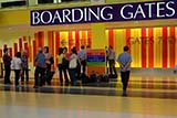 Singaporeans waiting to be first to board the plane  - Click for larger image