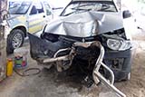 The result of a pickup truck meeting a tree - Click for larger image
