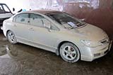 A Honda Civic that was completely submerged in the flood - Click for larger image